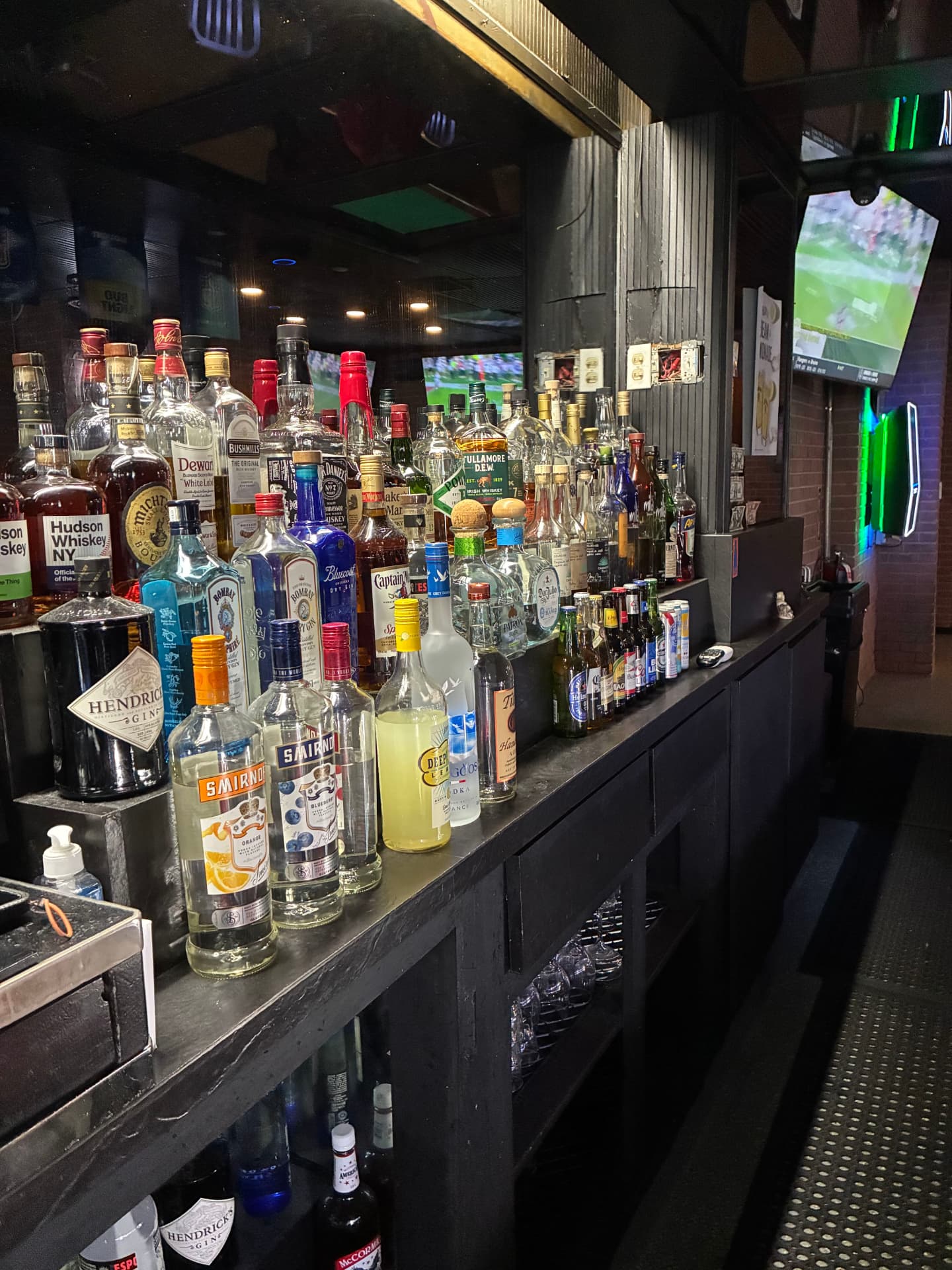 Bottles and cans behind the bar